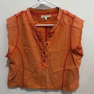 Size small orange shirt
